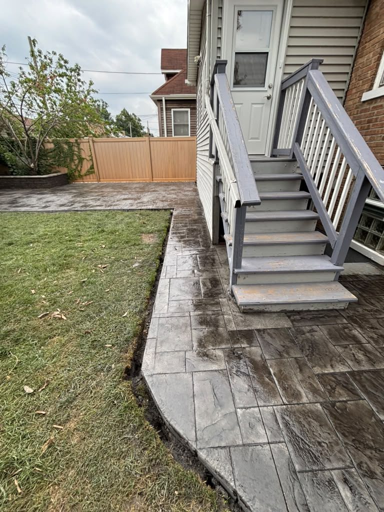 Finished stamped concrete walkway to the back stairs — Chicago, IL