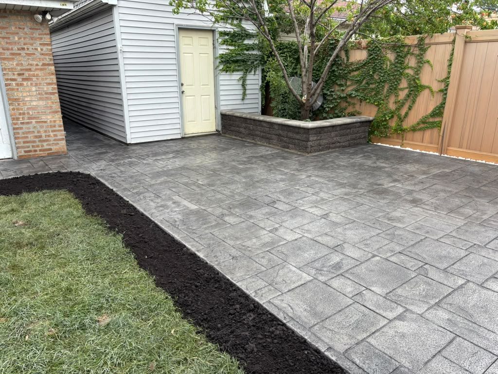 Finished patio, block wall and fresh mulch bed — Chicago, IL
