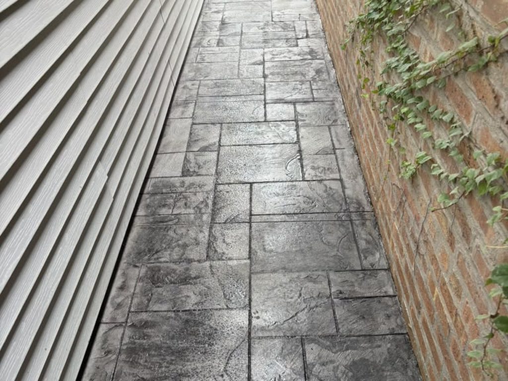 New stamped concrete side walkway between houses — Chicago, IL